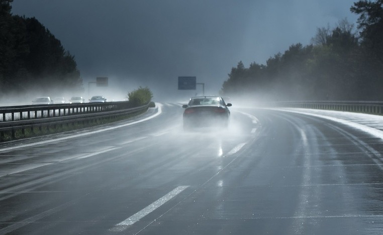Mechanic checking car fluid's 